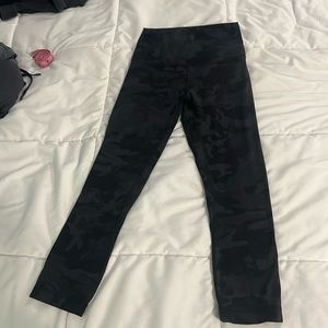 Lulu leggings , size 4 , 28 inches from waist to bottom hem.Black/grey